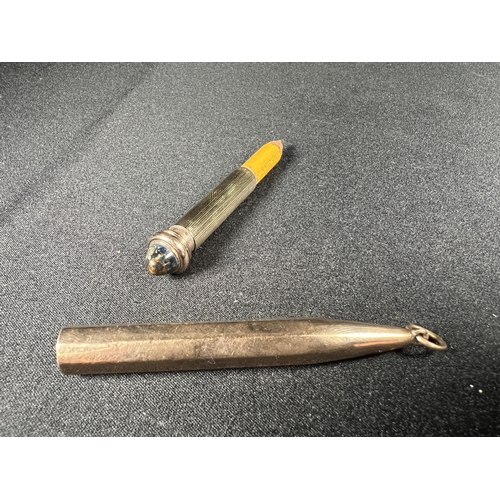 516 - Gold mounted pencil with stone set top, gross 15.7g, 9cm