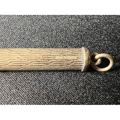 534 - 9ct gold propelling toothpick, 5.3g gross, 5cm long
