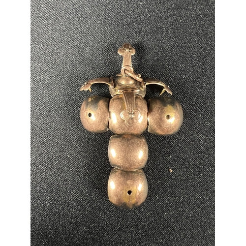 547 - Gold Metamorphic ball that converts to a cross, 7.4g