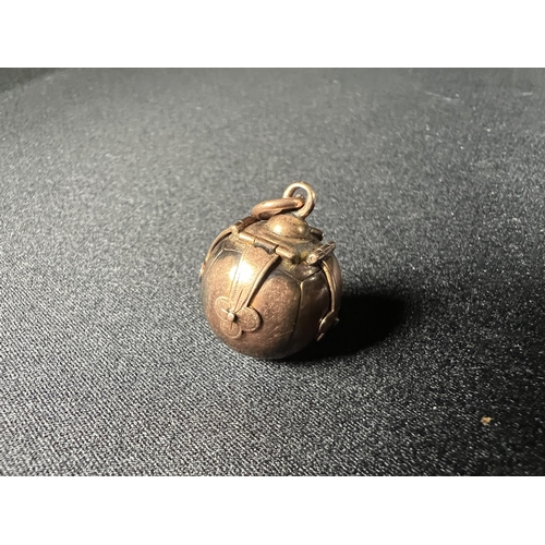 547 - Gold Metamorphic ball that converts to a cross, 7.4g