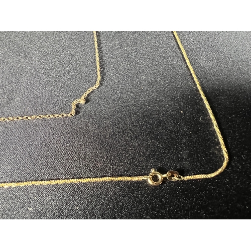 556 - 2 silver gilt necklace, and a pr of silver gilt earrings