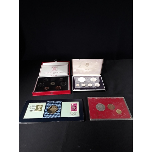 313 - 2 Coin sets and a concorde coin