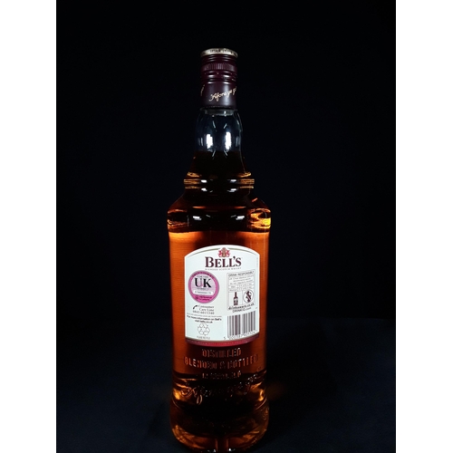 41 - 1l bottle of Bells Blended Scotch Whiskey