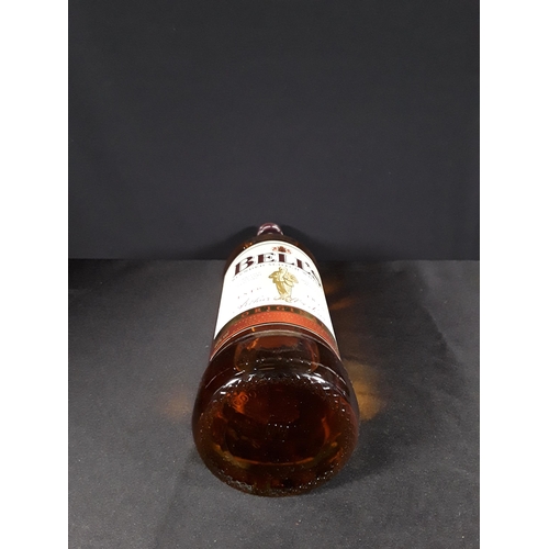 41 - 1l bottle of Bells Blended Scotch Whiskey