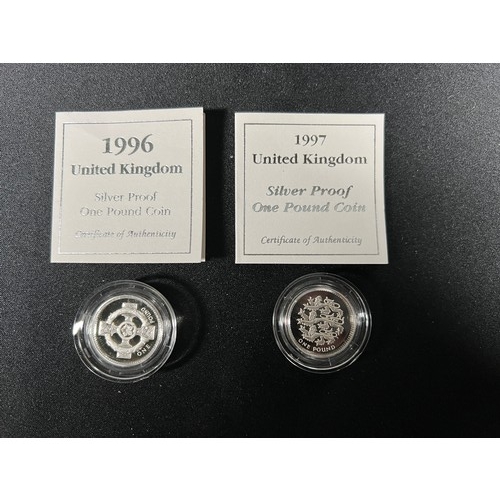 291 - 2 Silver £1 coins both with certificates