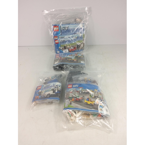 430 - 4 lego sets 7288, 60232, 60148 & 7285 - Mobile police unit, Garage centre, ATV race team & police do... 