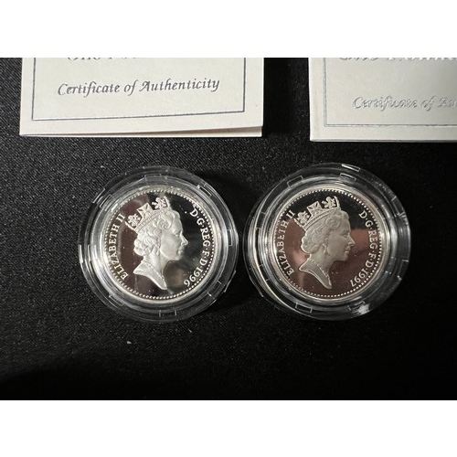 291 - 2 Silver £1 coins both with certificates