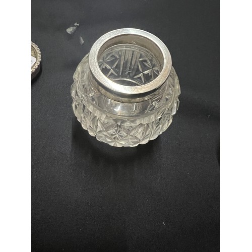 124 - 4 cut glass silver topped vanity bottles