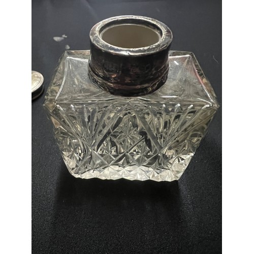 124 - 4 cut glass silver topped vanity bottles