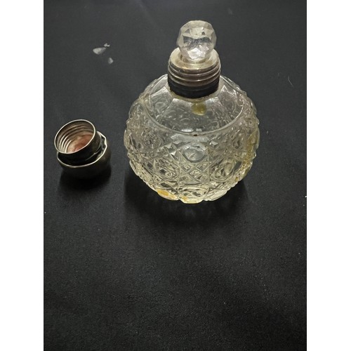 124 - 4 cut glass silver topped vanity bottles