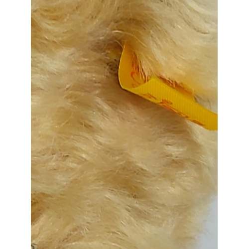 89 - Steiff jointed teddy with medal