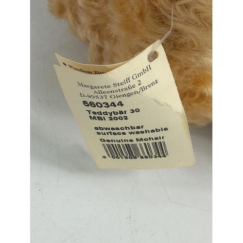 89 - Steiff jointed teddy with medal