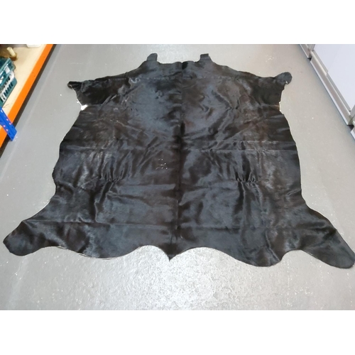 96 - Large cow hide rug, approx 210 x 197cms