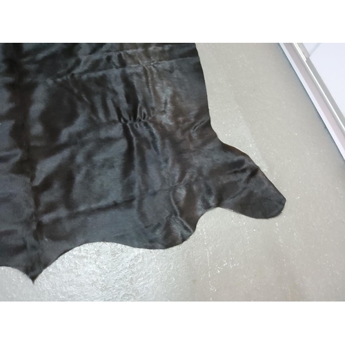 96 - Large cow hide rug, approx 210 x 197cms