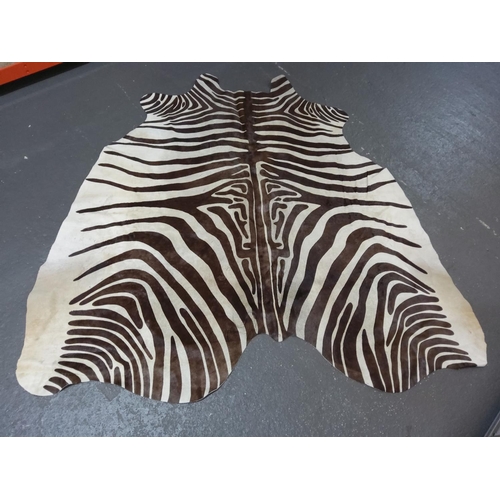 97 - Large cow hide rug with zebra print, approx 175 x 170cms