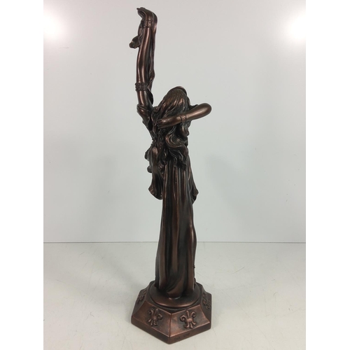 3 - Cold cast figure of a dancing lady, 50cms in height