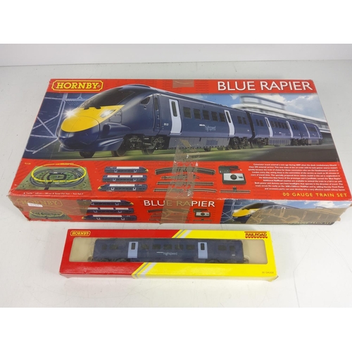 64 - Hornby Blue Rapier with one additional carriage