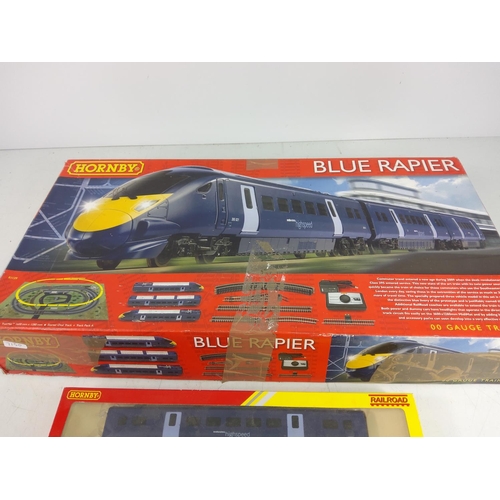 64 - Hornby Blue Rapier with one additional carriage