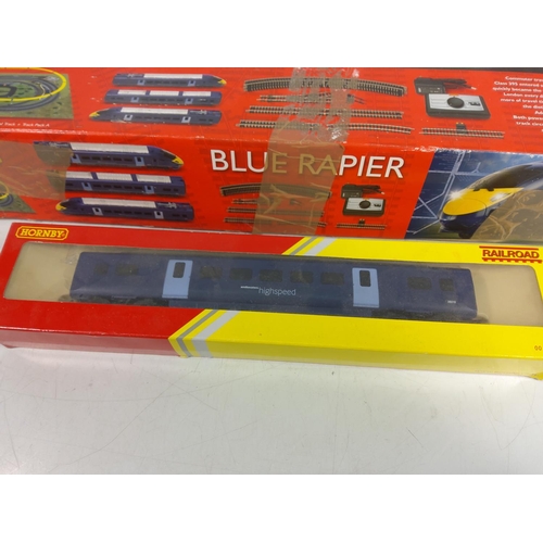 64 - Hornby Blue Rapier with one additional carriage