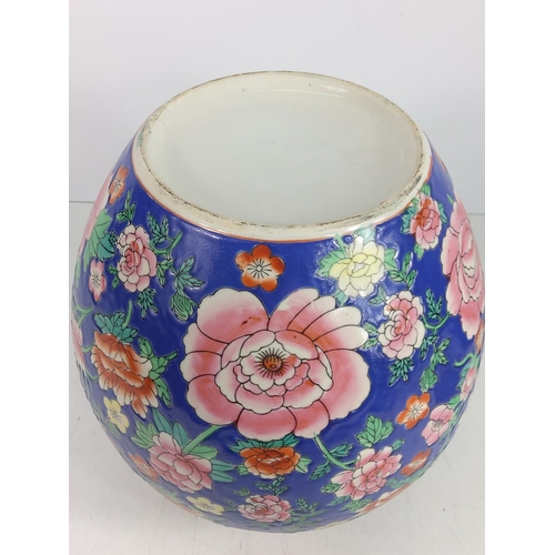 99 - Oriental ginger jar with wooden base, approx 46cms on base, 32cms off base