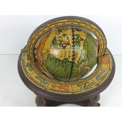 7 - Globe and a mantle clock