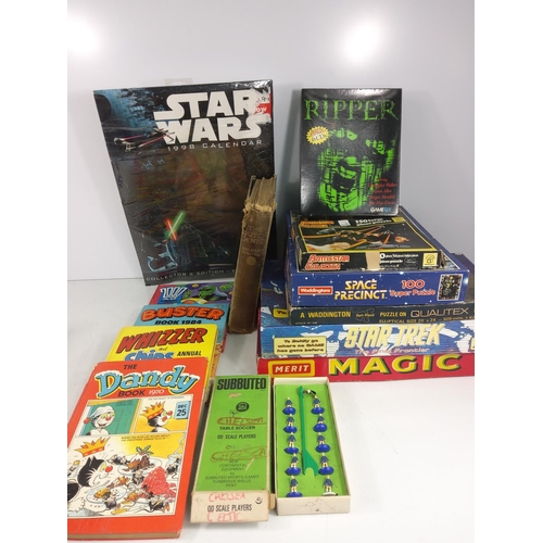 15 - Large box of books and games, a seat pad, pictures and RAF cigarette case