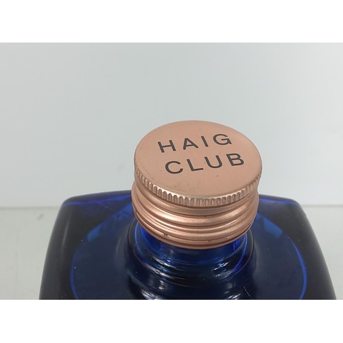 52 - Boxed bottle of Haig Whiskey