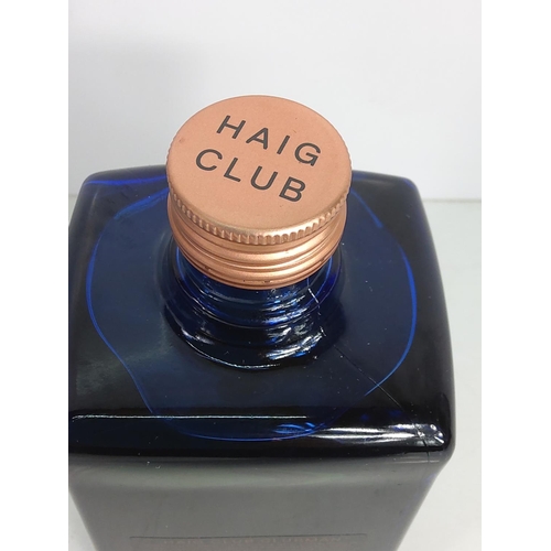 53 - Boxed bottle of Haig Whiskey