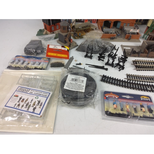 74 - A quantity of model railway sidings, accessories and people