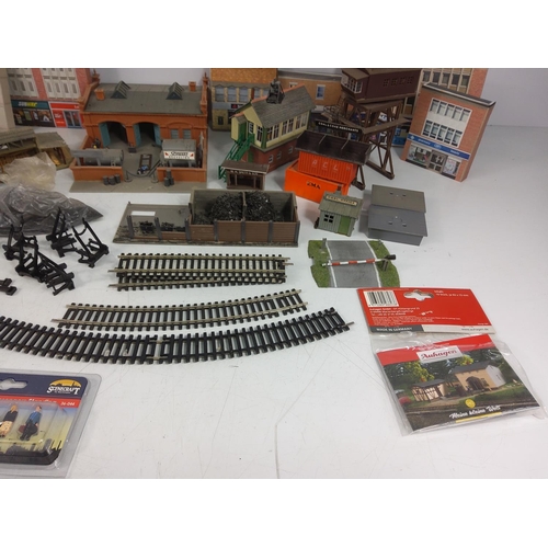 74 - A quantity of model railway sidings, accessories and people