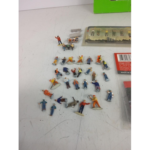 74 - A quantity of model railway sidings, accessories and people