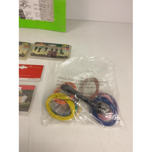 74 - A quantity of model railway sidings, accessories and people