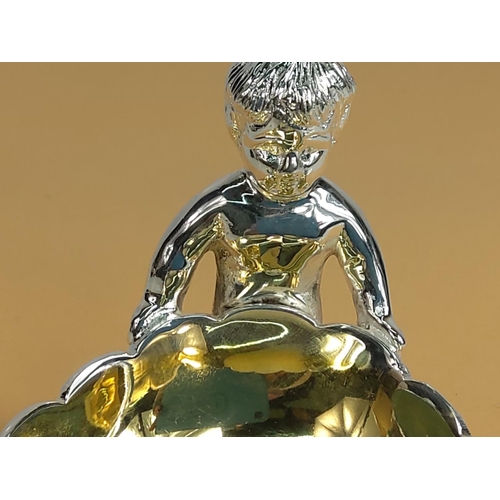 174 - Plated cherub salt pot with spoon, 12 x 9 x 10cms