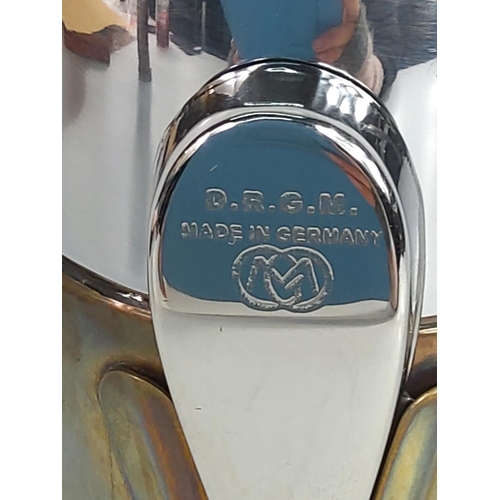 116 - Cocktail shaker in the form of an air ship, 25cms in height