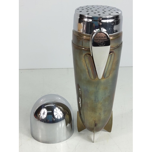 116 - Cocktail shaker in the form of an air ship, 25cms in height