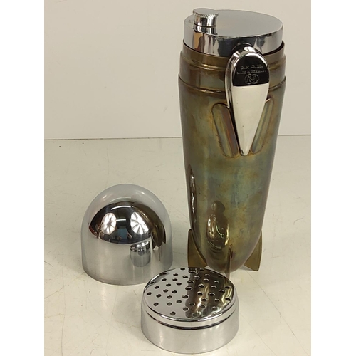 116 - Cocktail shaker in the form of an air ship, 25cms in height
