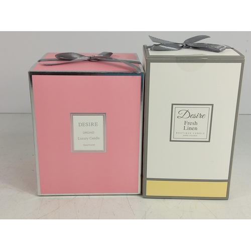 122 - 2 boxed candles