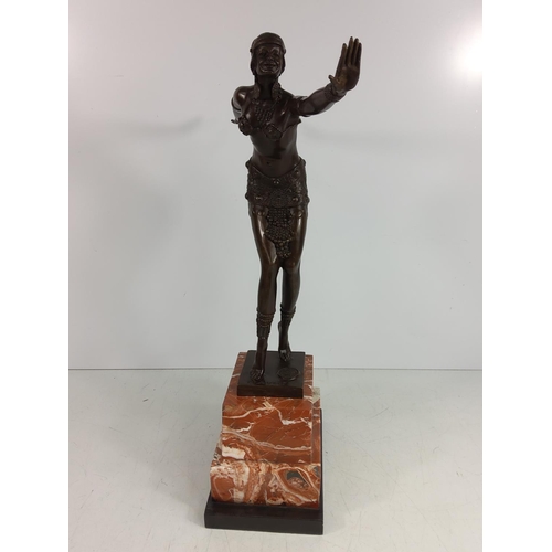 124 - Cast bronze dancing lady on marble base, 50cms in height