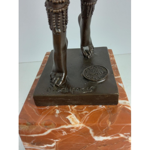 124 - Cast bronze dancing lady on marble base, 50cms in height