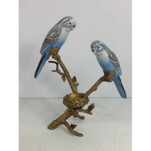 129 - Porcelain and bronze bugie tea light holder