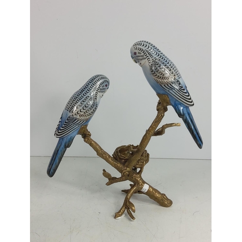 129 - Porcelain and bronze bugie tea light holder