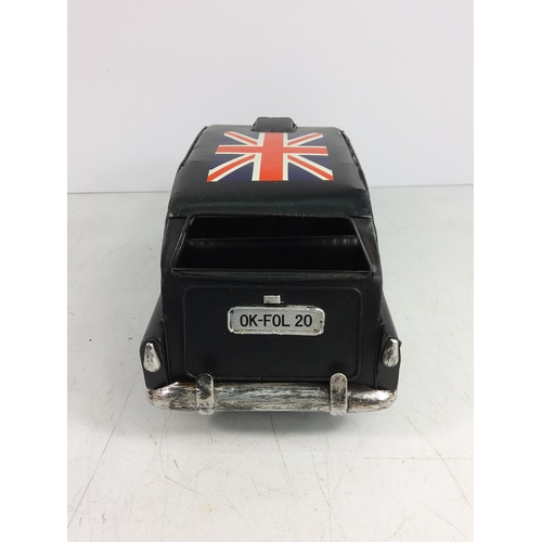 130 - Tin plate model of london buss