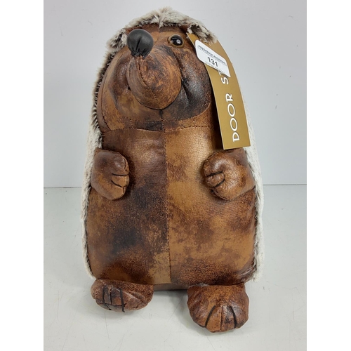 131 - Faux leather door stop in the form of a hedgehog