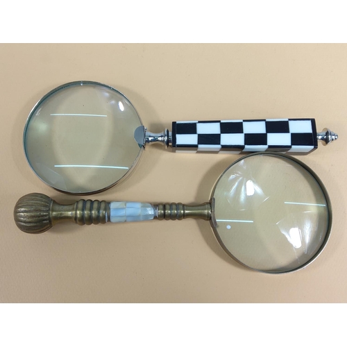 143 - 2 New magnifying glasses