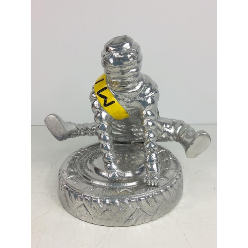 146 - Michelin man in Yoga pose, 25cms in height x 21cms in width