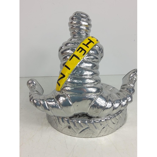 146 - Michelin man in Yoga pose, 25cms in height x 21cms in width