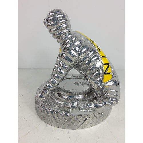 146 - Michelin man in Yoga pose, 25cms in height x 21cms in width