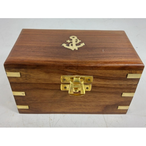 150 - Wooden cased opera glasses
