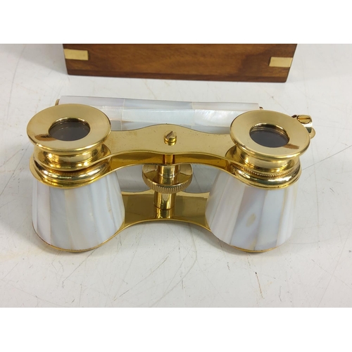 150 - Wooden cased opera glasses
