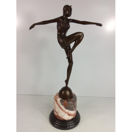 156 - Cast bronze dancing lady on marble base, 55cms in height